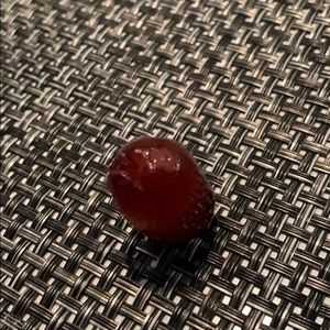 A half-eaten grape